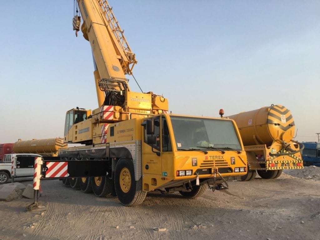 150-ton Terex crane on construction site in Pakistan, showcasing heavy lifting capabilities for reliable crane rental services.