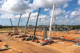 Cranes lined up on a construction site in Southern Massachusetts, showcasing reliable lifting solutions and advanced equipment for efficient project execution.